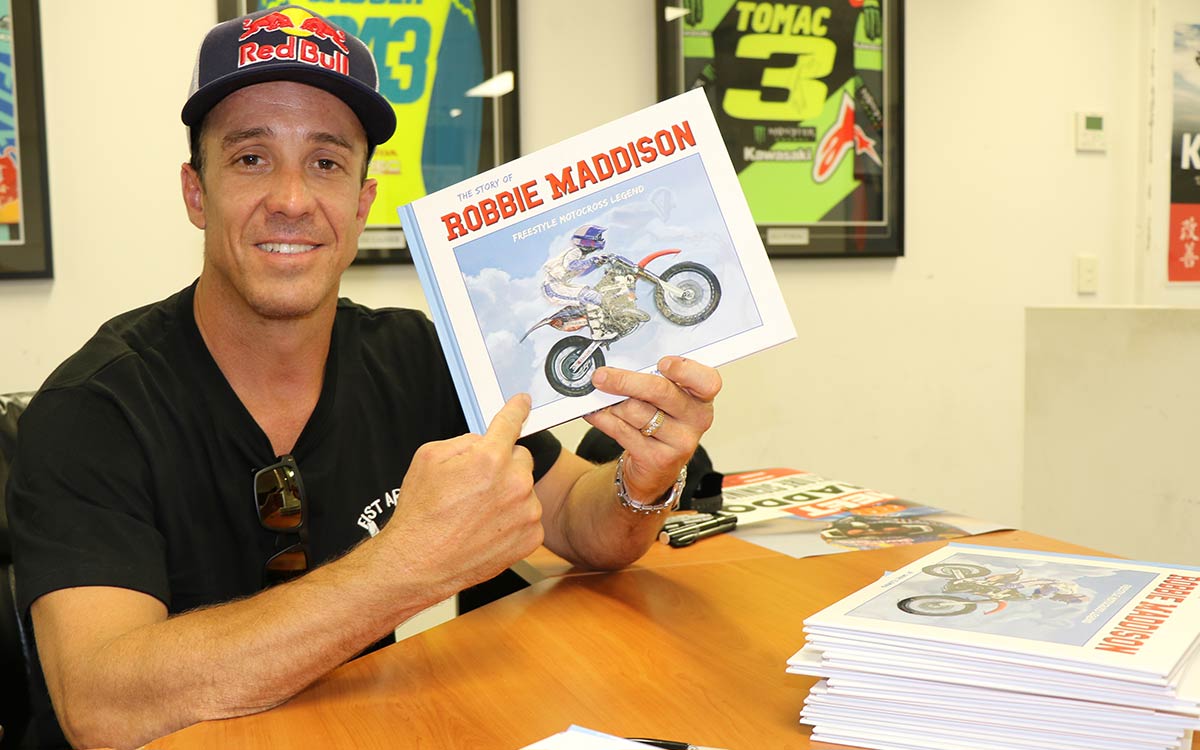 Robbie Maddison with his book