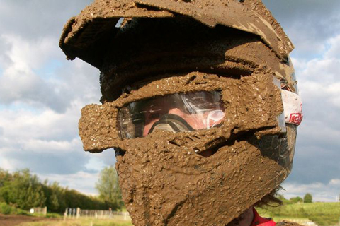 Muddy dirt bike goggles