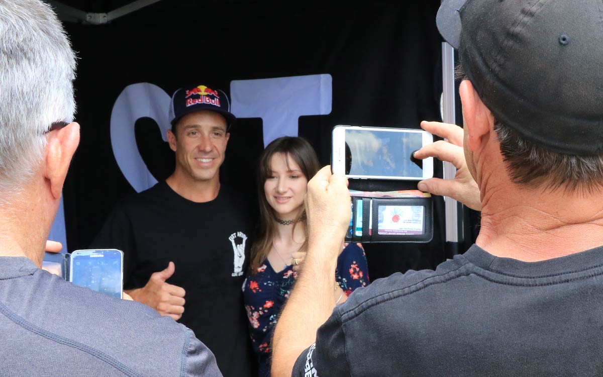 People getting photos with Robbie Maddison