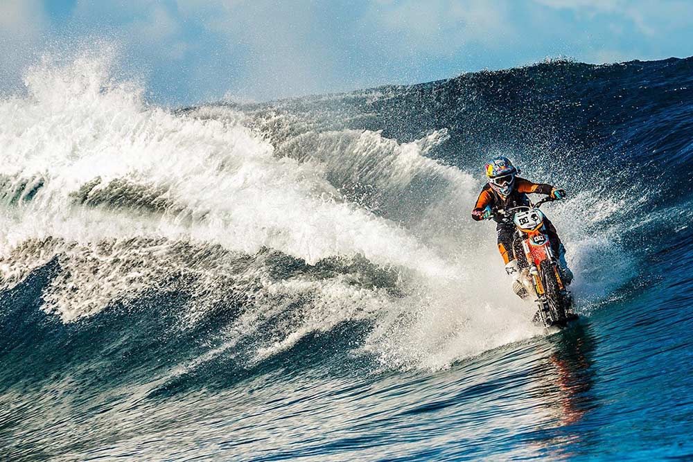 Robbie Maddison Rides Wave in Tahiti on Motorbike